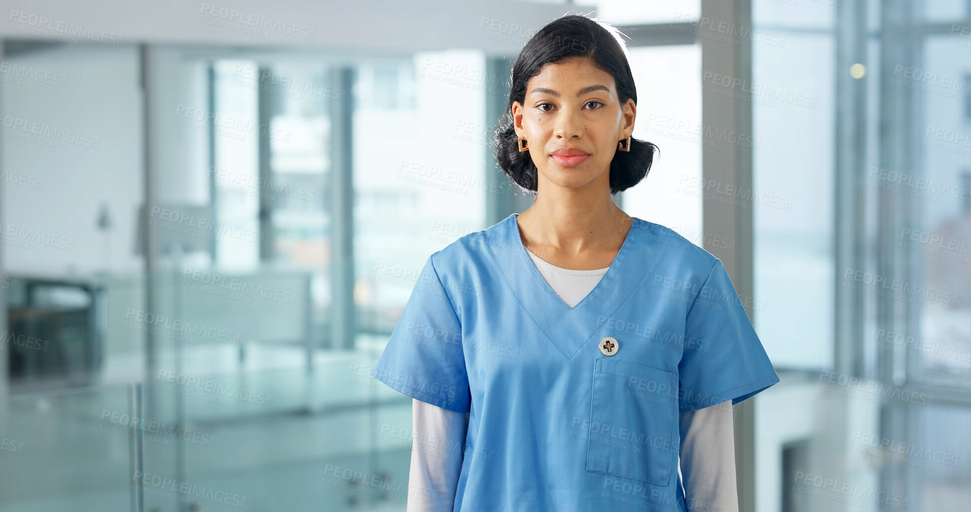 Buy stock photo Portrait, nurse and student at hospital for medical, education and residency for patient care. Serious, woman or learning in workplace for nursing, internship and career pride for healthcare services