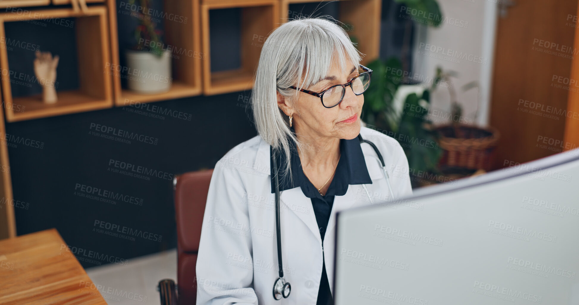 Buy stock photo Doctor, research and woman with computer in office, healthcare or reading treatment plan on website. Hospital, medical professional and mature person with technology, online and checking diagnosis
