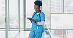 Nurse, reading and woman with tablet in clinic, healthcare or research for treatment plan on website. Hospital, medical professional and black person with tech, online and scroll diagnosis on app