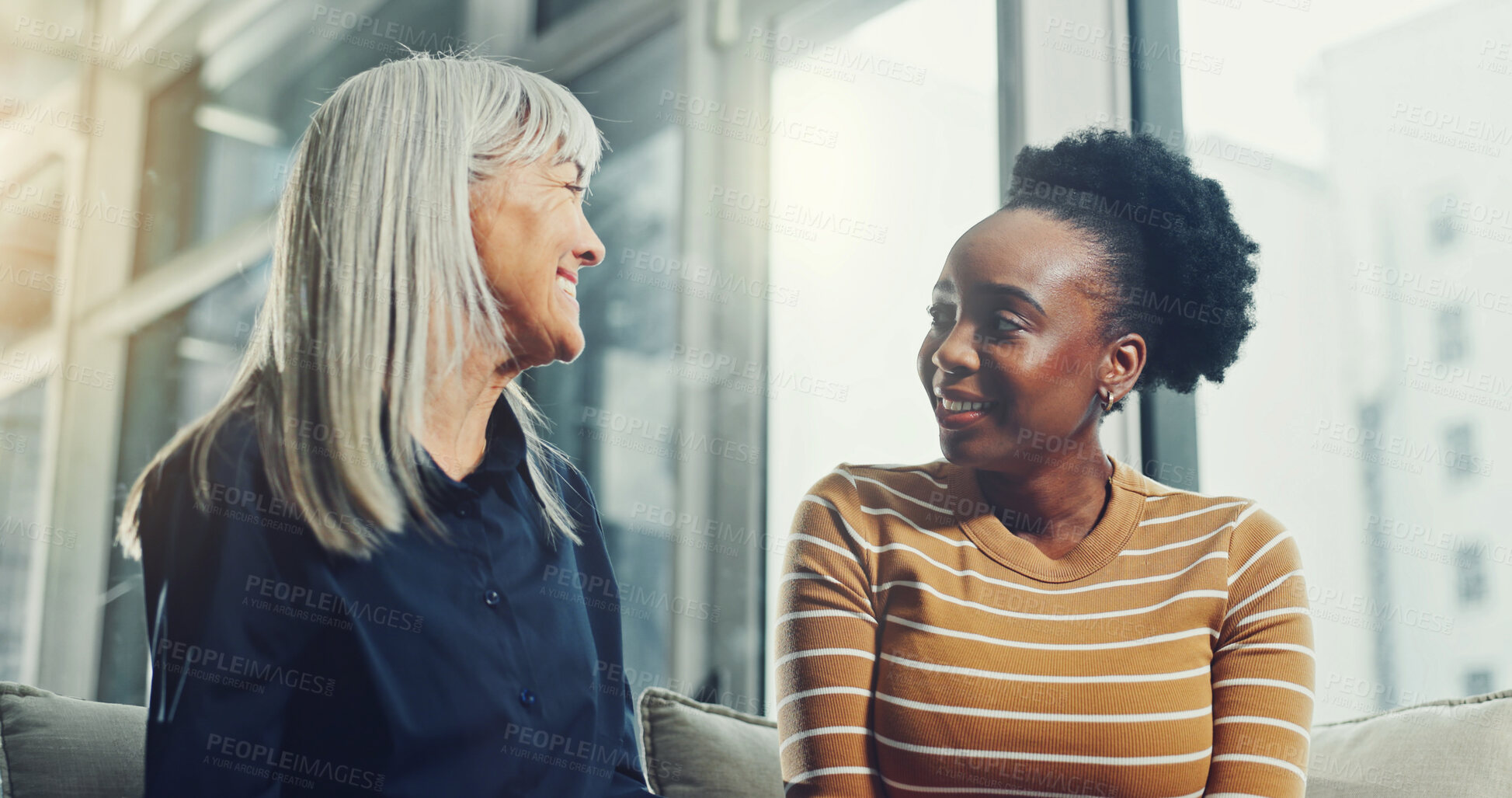 Buy stock photo Happy, women and therapist with patient for medical discussion, help or assistance in home. Female people, psychologist and talking with client or smile for emotional support or trust in house