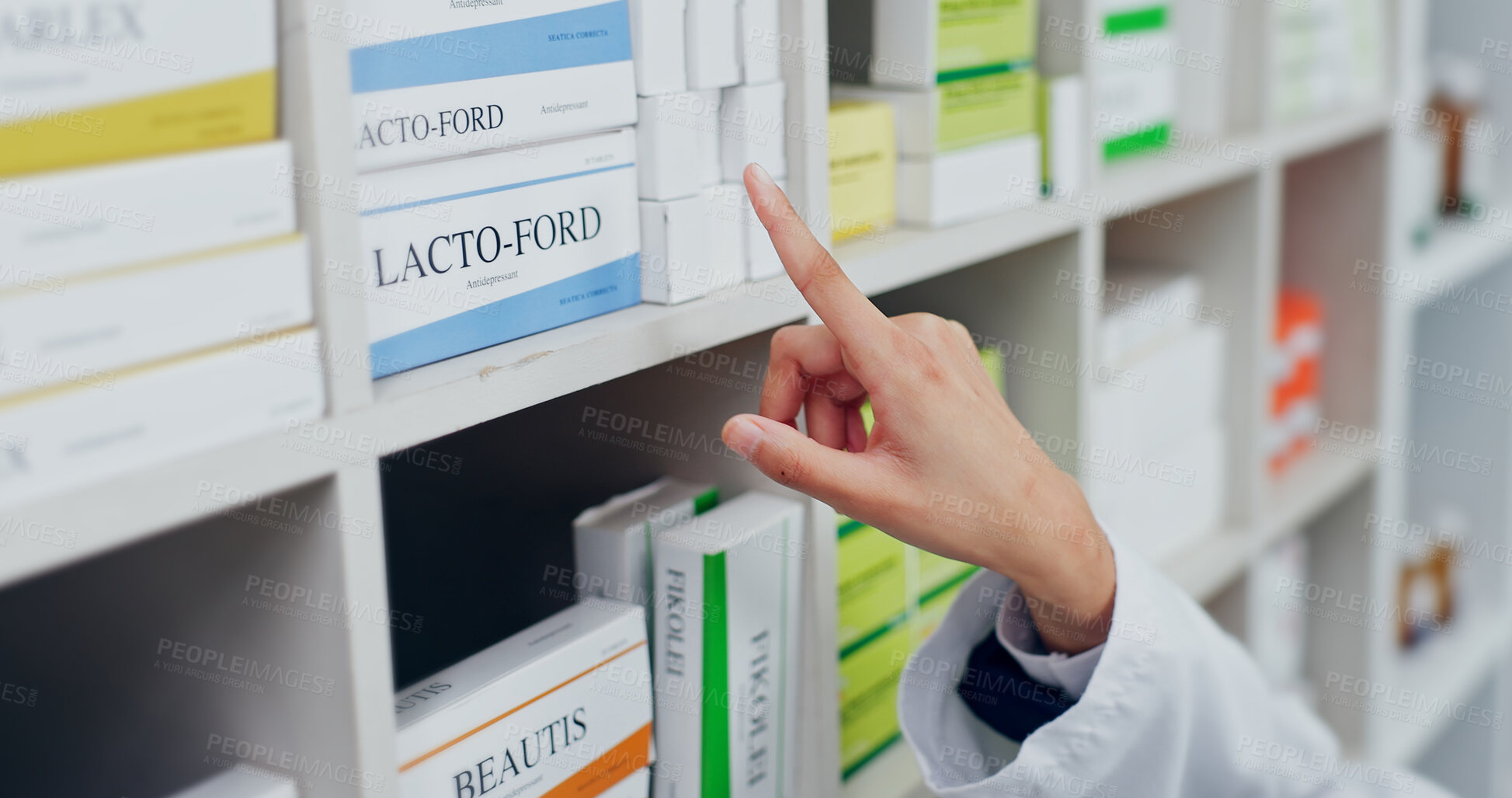 Buy stock photo Person, pharmacist or hands pointing with medication on shelf for pharmaceutical choice or options. Employee, healthcare worker or selection with boxes for medical treatment or dispensary in pharmacy
