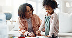 Mom, child and learning with homework for education, childhood development or academic progress. Happy, mother or elementary school girl with documents or help for student assessment or assignment