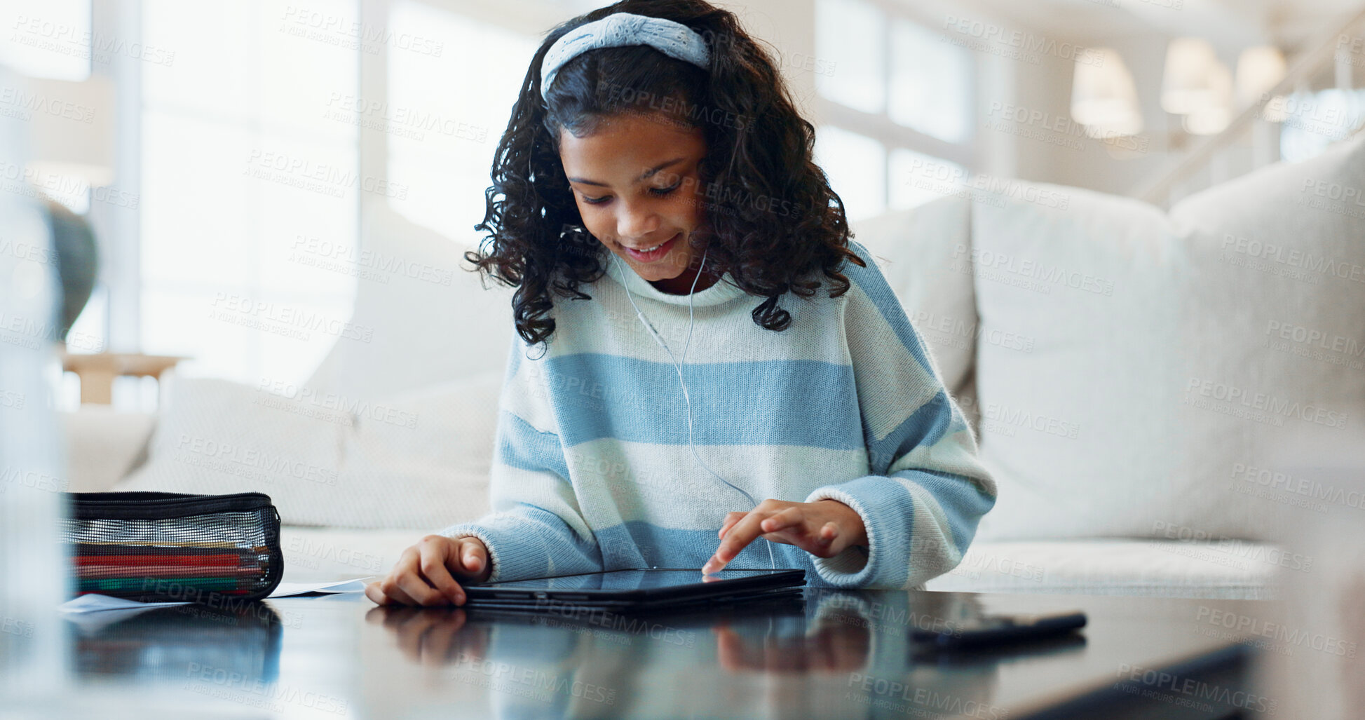 Buy stock photo Happy, girl and elearning with tablet in home for online course, education or academic app. Child, kid or student with smile on technology for ebook, network connection or distance learning in house