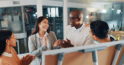 Buy stock photo Applause, discussion and business people in office at night with teamwork, research or brainstorming. Clapping, deadline and group of creative editors at board for article project at startup.