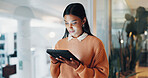 Creative, tablet and business woman in office for project management, research and digital marketing. Night, online and person on tech for website, planning and funding review for brand advertising