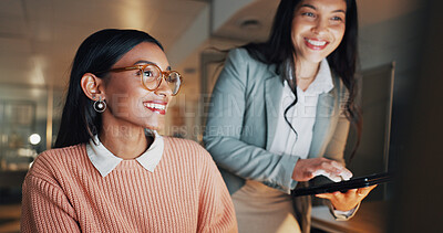 Buy stock photo Tablet, night and business women in office with collaboration on creative project with deadline. Happy, technology and editor with manager for feedback with online article at startup workplace.