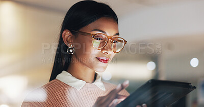 Buy stock photo Office, tablet and business woman with glasses for project management, research and marketing campaign. Startup, night and person on tech for website, planning and brand awareness for advertising