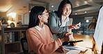 Discussion, night and business women in office with collaboration on creative project with deadline. Happy, technology and editor with manager for feedback with online article at startup workplace.