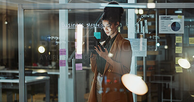 Buy stock photo Night, business and woman on tablet in glass office for finance review, budget planning and research. Statistics, tech and person with sticky notes for profit growth, strategy and financial agenda