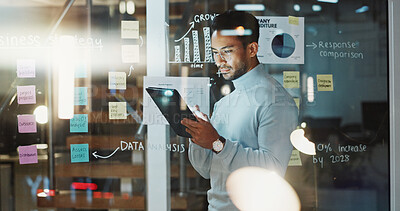 Buy stock photo Strategy, business and man on tablet in glass office for data analysis, financial growth or research. Night, tech and person with sticky notes, charts and bokeh for budget report, review and planning