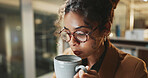Coffee, thinking and glasses with business woman in office for reflection, caffeine break and night. Brainstorming, drink and overtime with person and mug in agency for vision, energy and beverage