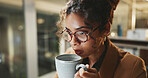 Coffee, planning and glasses with business woman in office for research, caffeine break and night. Reading, drink and overtime with female person and mug in agency for project, energy and beverage