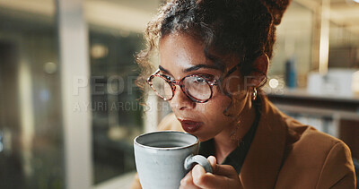 Buy stock photo Coffee, planning and glasses with business woman in office for research, caffeine break and night. Reading, drink and overtime with female person and mug in agency for project, energy and beverage