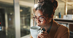 Coffee, online and glasses with business woman in office for research, caffeine break and night. Reading, drink and overtime with female person and mug in agency for project, space and beverage