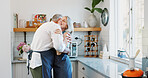 Hug, cooking and love with old couple in kitchen for bonding, romantic gesture and meal prep. Connection, support and food with senior man and woman in home for retirement, embrace and recipe