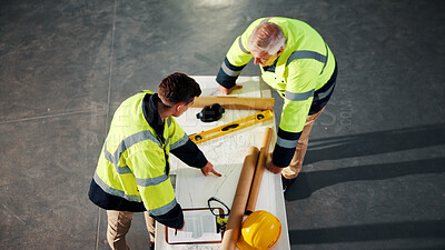 Buy stock photo Civil engineer, team and men with blueprint in building, conversation or plan for renovation project. Architect, above and people with paperwork, discussion and collaboration for property development