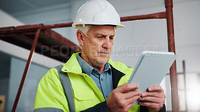 Buy stock photo Engineer, man and research at construction site with tablet, app or check property design for safety. Mature person, engineering expert and online with tech for building compliance, review and plan.