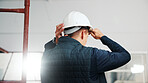 Back, man and engineer at site with helmet, protection and inspection compliance for construction. Flare, person and contractor with hard hat for ppe, safety and quality control of building progress