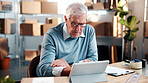Reading, man and tablet in small business for logistics, monitor live shipping or online invoice. Review, mature owner and tech in storage for inventory system, track route and delivery status update