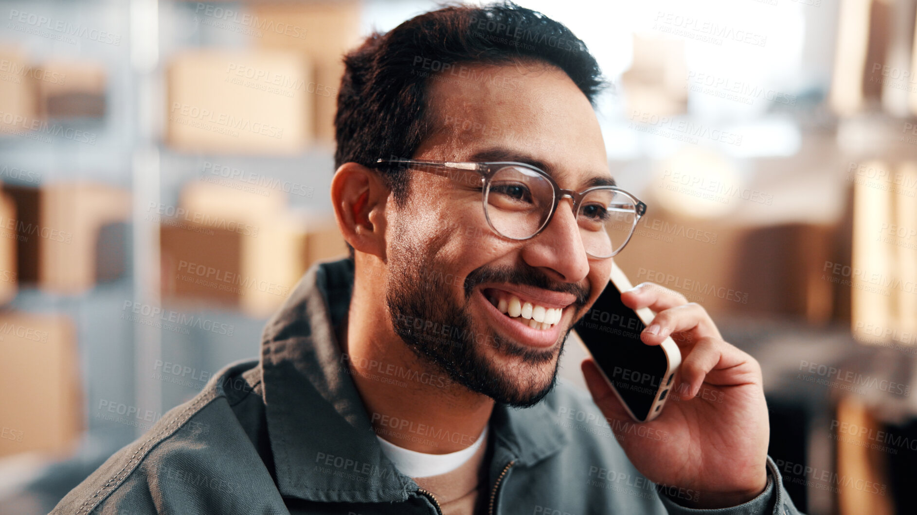 Buy stock photo Small business, man or happy with phone call for logistics, shipping enquiry or delivery feedback. Supply chain, worker and mobile chat in storage for customer service, courier update or conversation