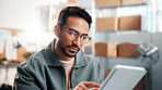 Reading, man and tablet in small business for logistics, fleet tracking system or online invoice. Glasses, person or tech in supply chain for shipment status, digital receipt or bill of lading review