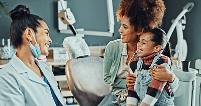 Buy stock photo Dentist, girl and mom with smile for dental, cleaning or gum disease in consultation for help. Doctor, talking and kid with mother for teeth whitening, oral care or treatment plan for mouth procedure