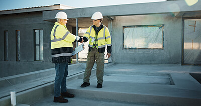 Buy stock photo Handshake, team and construction site with people for partnership, clipboard and agreement. Building development, civil engineering and happy men shaking hands outdoor for home renovation project