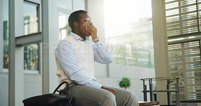 Buy stock photo Tired, yawn and business man in city at bus stop, wait and morning commute with low energy. Black person, bored or worker with fatigue in town outdoor, travel stress or long work shift with burnout