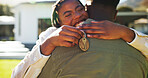 Outdoor, key and happy couple hug by new house with celebration, real estate goals and achievement. Black people, dating or embrace in backyard with keychain, moving and relocation to dream home.