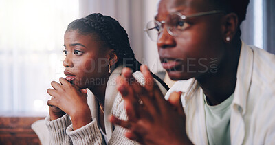 Buy stock photo Woman, couple and watching tv in living room with worry, sports game and suspense for contest final. Black people, dating and streaming soccer match in home with concern, broadcast and anxious fans.