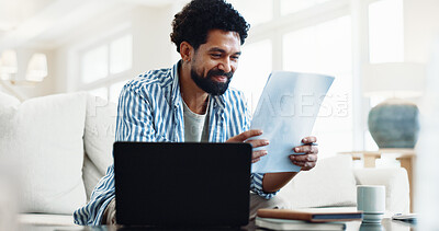 Buy stock photo Smile, man and reading at house with document, finance report and budget for household bills. Happy, person and laptop in lounge with paperwork, financial invoice and bank statement for rebate payout