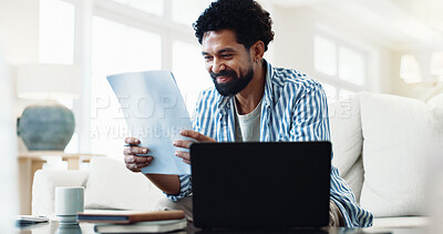 Buy stock photo Happy, man and reading at house with document, finance report and budget for household bills. Smile, person and laptop in lounge with paperwork, financial invoice and bank statement for rebate payout