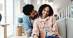 Happy, couple and relax in living room with love, romantic connection and care for bonding together. Portrait, people and smile in house with relationship commitment, loyalty or support for companion