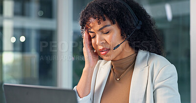 Buy stock photo Stress, call center and woman in office at night with burnout, fatigue or pressure for query. Mic, laptop and technical support consultant with headache for crm, voip system or customer service.