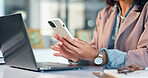 Hands, laptop and phone with business woman at desk in office for communication or feedback. App, technology and typing on mobile with corporate employee at work for email, review or text message