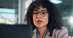Glasses, research and businesswoman with computer in office for finance report for investment planning. Reading, technology and financial manager with email update on revenue growth in workplace.