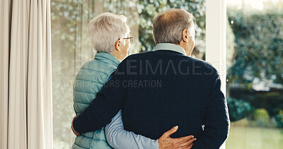 Buy stock photo Love, thinking and old couple at window with hug, relationship reflection and memory in retirement. Back, connection and senior people with embrace, romantic flashback or peaceful perspective in home