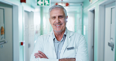 Buy stock photo Medical, portrait or man in hospital with arms crossed, physician or pride as general practitioner. Ambition, happy or mature doctor with confidence, surgeon or about us in healthcare profession.