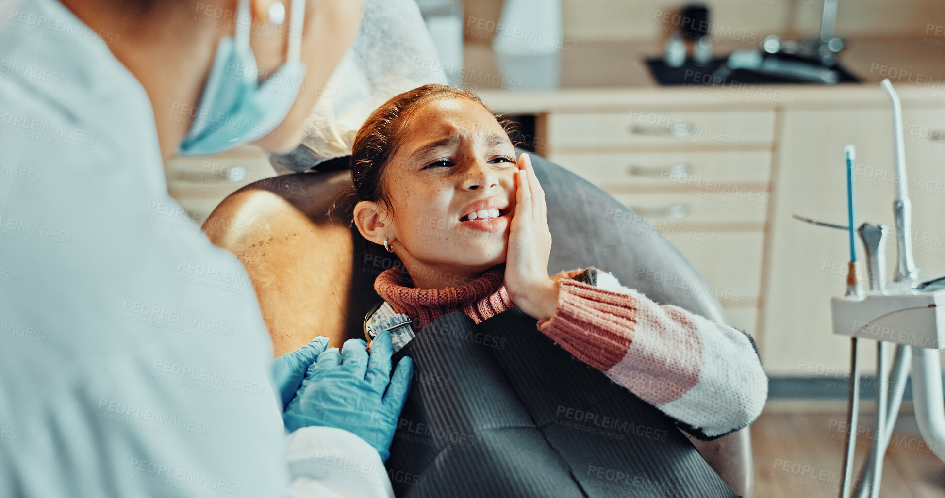Buy stock photo Dentist, support and child with toothache in office, help and consultation for gum disease or cavity. Medical professional, people and kid with bacterial infection, oral care and discomfort in clinic