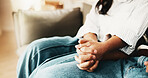 Couple, holding hands and bonding with partner in lounge, trust and relationship commitment in home. Marriage, loyalty and support for spouse, people and solidarity for love and partnership in house