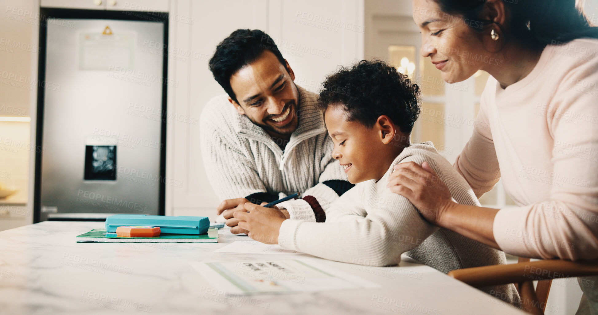 Buy stock photo Happy, parents and child in house with homework, assistance and support for knowledge development. People, proud mom and dad at kitchen counter with son, education and help for school assignment.