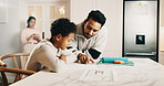 Father, child and talk at kitchen counter with homework, teaching knowledge or cognitive development. Man, son and discussion in home for school task, education or help with critical thinking skills.