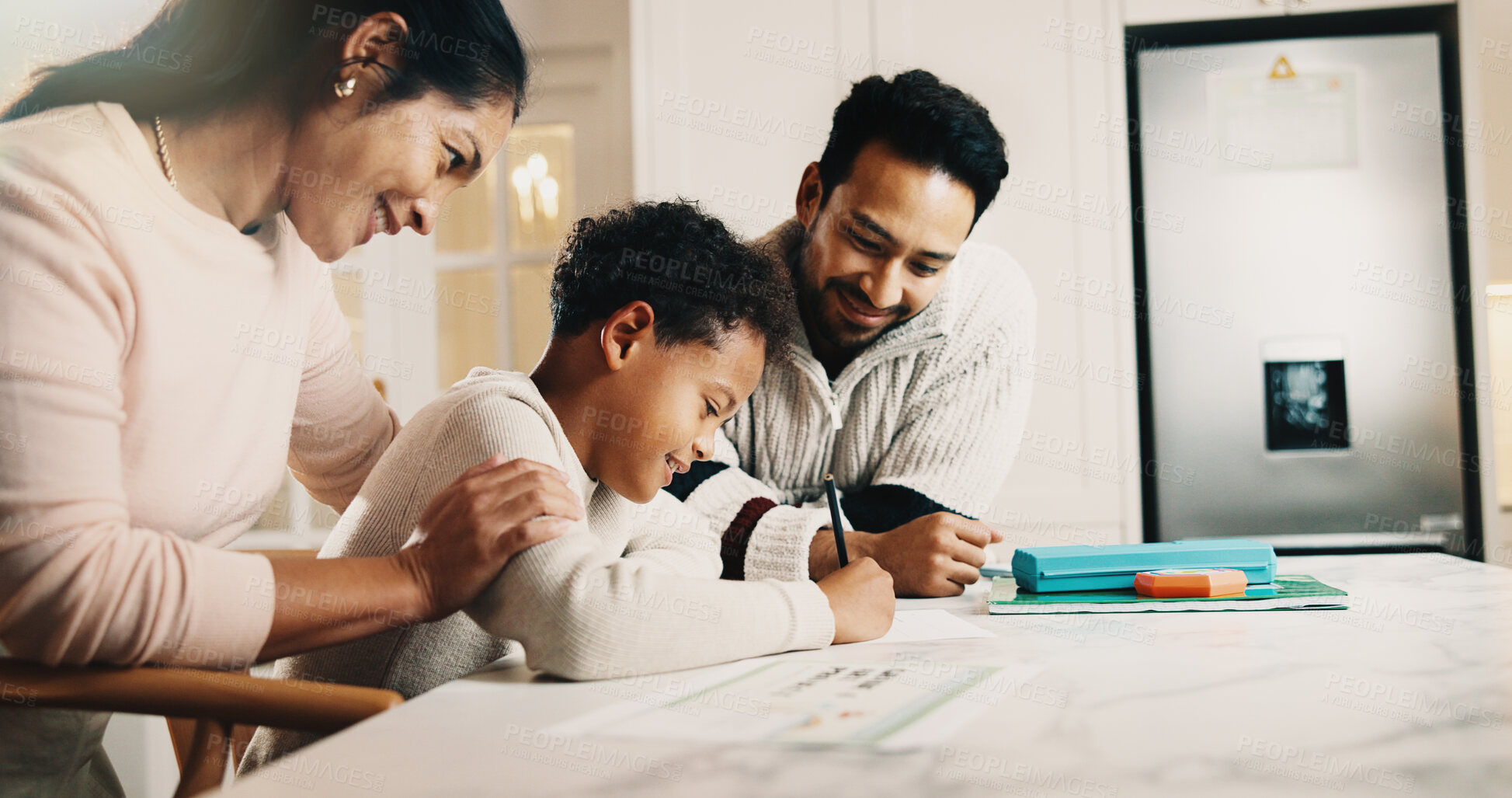 Buy stock photo Parents, child and writing in house with homework, assistance and support for knowledge development. Happy people, mom and dad at kitchen counter with son, education and help for school assignment.