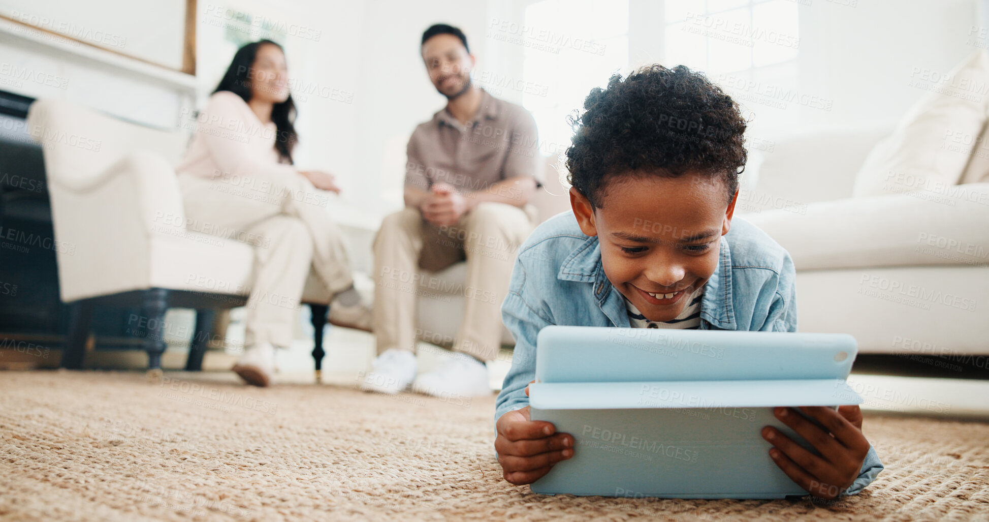 Buy stock photo Family, boy and tablet with smile on floor in living room of home for learning or online gaming. App, development and parents with child in house together for education, relax or streaming service