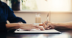 Lawyer, hands and document with signature for legal agreement, contract or application. People, attorney or pointing with client, paperwork or form for policy, business deal or insurance in office