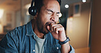 Night, yawn and tired man in call center with computer, telemarketing and burnout from overtime work. Late, exhausted person and overworked consultant in office with desktop, fatigue and sleepless.