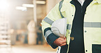 Hands, engineer and helmet at site for construction, safety and compliance for architecture. Flare, person or ppe in warehouse with hardhat, protection and workplace protocol for building development