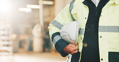 Buy stock photo Hands, engineer and helmet at site for construction, safety and compliance for architecture. Flare, person or ppe in warehouse with hardhat, protection and workplace protocol for building development