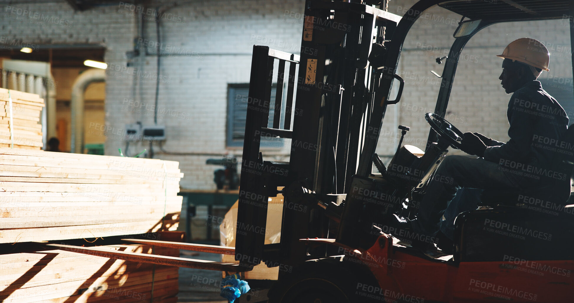 Buy stock photo Carpentry, forklift or man in workshop with timber, stock control or unloading for building project.Flare, ppe or loader with lift truck, material transport or inventory management in woodworking.