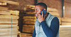 Angry, black man and carpenter in workshop with phone call, bad news and wrong timber order. Frustrated, male person and mobile at warehouse for carpentry fail, production rejection and project delay